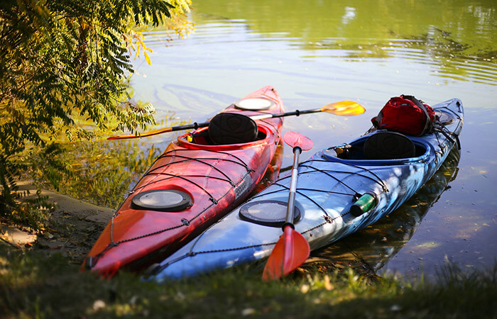 Two people kayaking in Maine