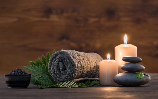 Massage accoutrement, towels, stones, candles